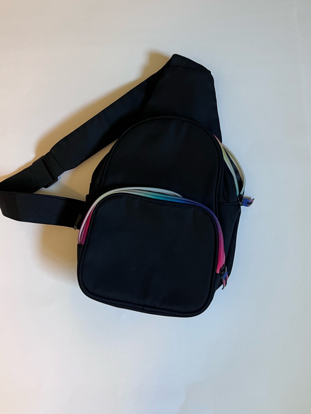 Unisex Black Crossbody Sling Bag with Multicolor Zipper Accents